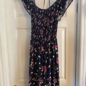 Knee length navy blue dress with pockets. pink, cream and yellow flowers. 4X .